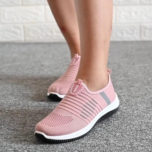 Women's summer breathable mesh shoes in red, black, and pink with flat heel