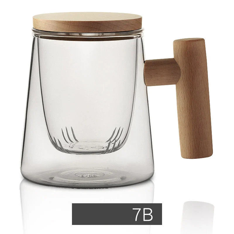 Premium glass tea infuser cup with wooden handle, offering a unique tea-water separation system and temperature-resistant construction for a refined tea experience.