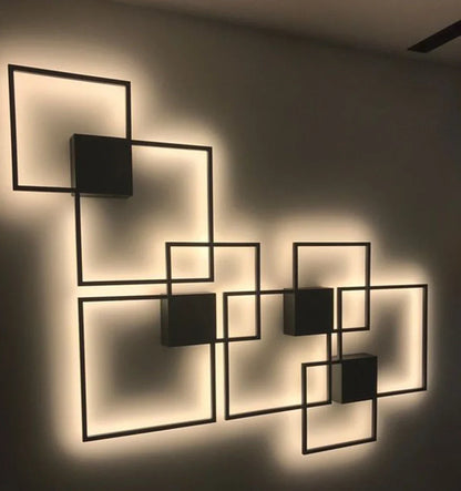 Square 35.3cm geometric LED wall light in white, iron frame with acrylic diffuser, 20W-24W output