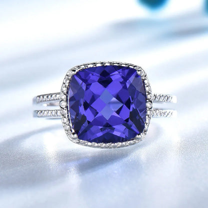 925 sterling silver ring with blue tanzanite gemstone, shown in UK sizes 6 to 10 for women's jewellery
