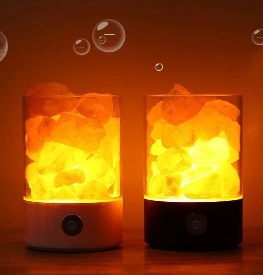 Himalayan salt lamp with warm, soothing glow and color-changing capabilities for air purification and relaxation