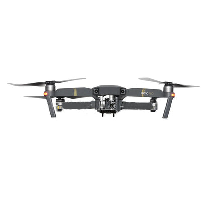 DJI Mavic drone camera with a selection of slim ND, UV, and CPL screw-on filters laid out beside it.