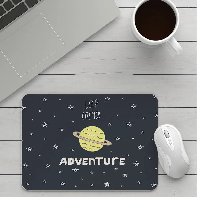 Customisable thick cartoon mouse pad with non-slip base, showing sample patterns like strawberry, cat, and whale designs.