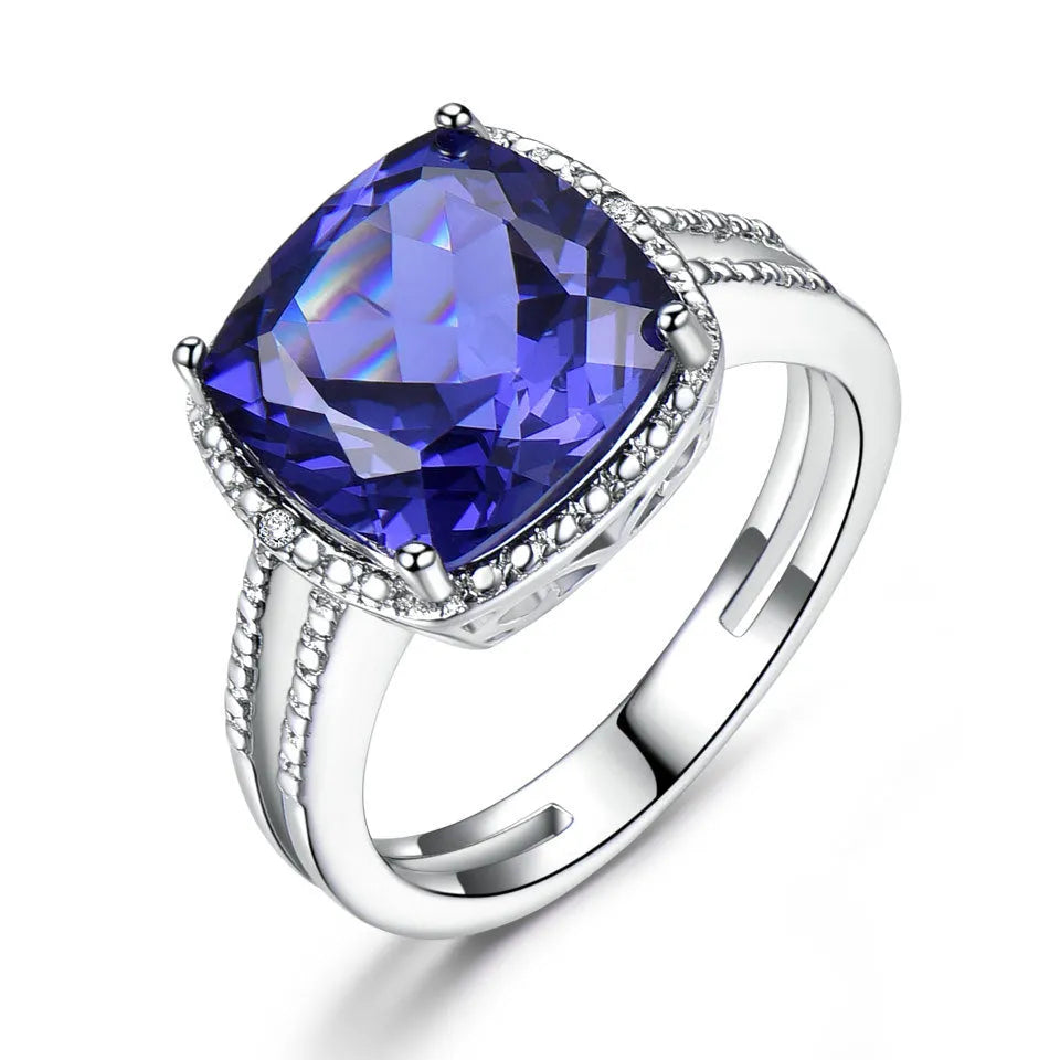 925 sterling silver ring with blue tanzanite gemstone, shown in UK sizes 6 to 10 for women's jewellery