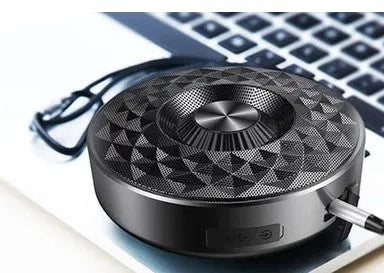 Bluetooth wireless mini speaker in black, orange, and silvery white colours showing compact 10cm size and USB-C port