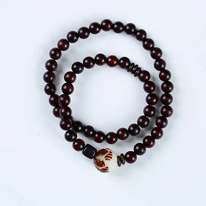 Natural rosewood double-ring bracelet with hand-knitted construction and retro floral design