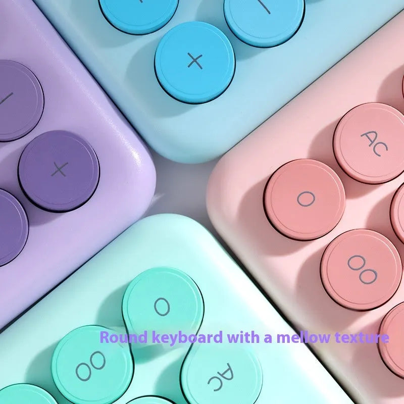 Gradient colour desk calculator with 12-digit display in violet, cherry blossom powder, glacier blue, or mint green options