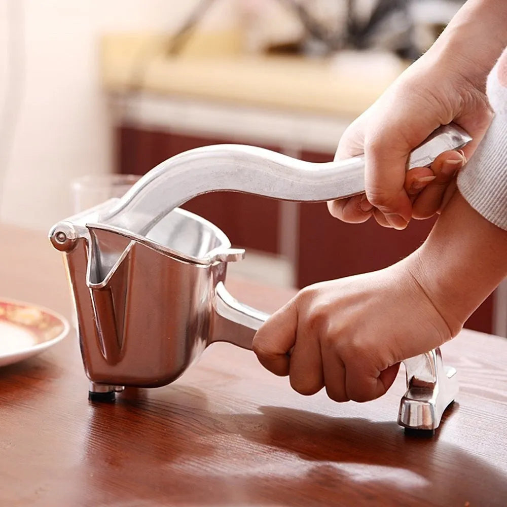 Silver heavy duty aluminium and steel lemon squeezer with large bowl and long handle.