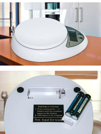 White electronic kitchen scale with digital display showing 1g precision and 5kg capacity measurements