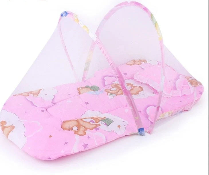Portable foldable baby bed with mosquito net and sleeping cushion in blue and pink