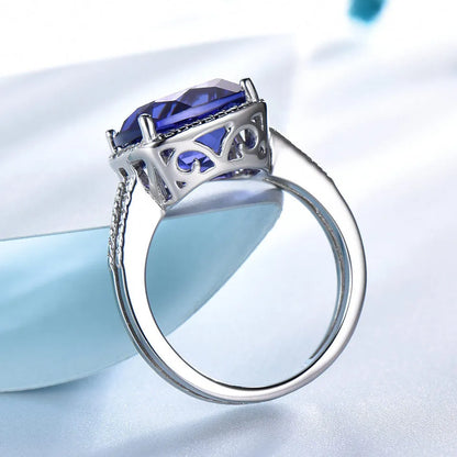 925 sterling silver ring with blue tanzanite gemstone, shown in UK sizes 6 to 10 for women's jewellery
