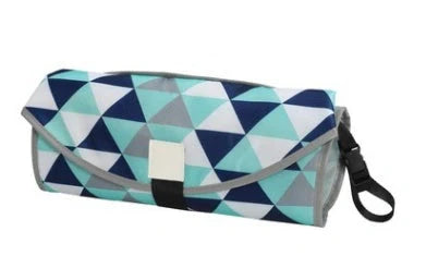 Portable and Waterproof Baby Changing Pad in various color designs, featuring a compact folded size and generous expanded size for comfortable diaper changes