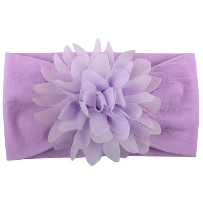 Adorable chiffon flower baby headband for your little princess, available in multiple colors.