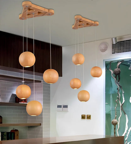 Nordic wood ball chandelier with adjustable height mechanism and solid wood construction