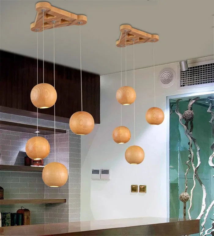Nordic wood ball chandelier with adjustable height showing wood construction and spherical design