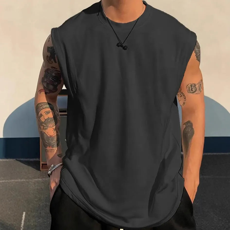 Men's loose solid colour cotton sleeveless tank top on a hanger.
