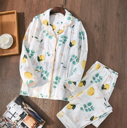 Traditional maternity pajama set with 100% cotton batik fabric, ankle-length trousers, and full-length bell sleeves