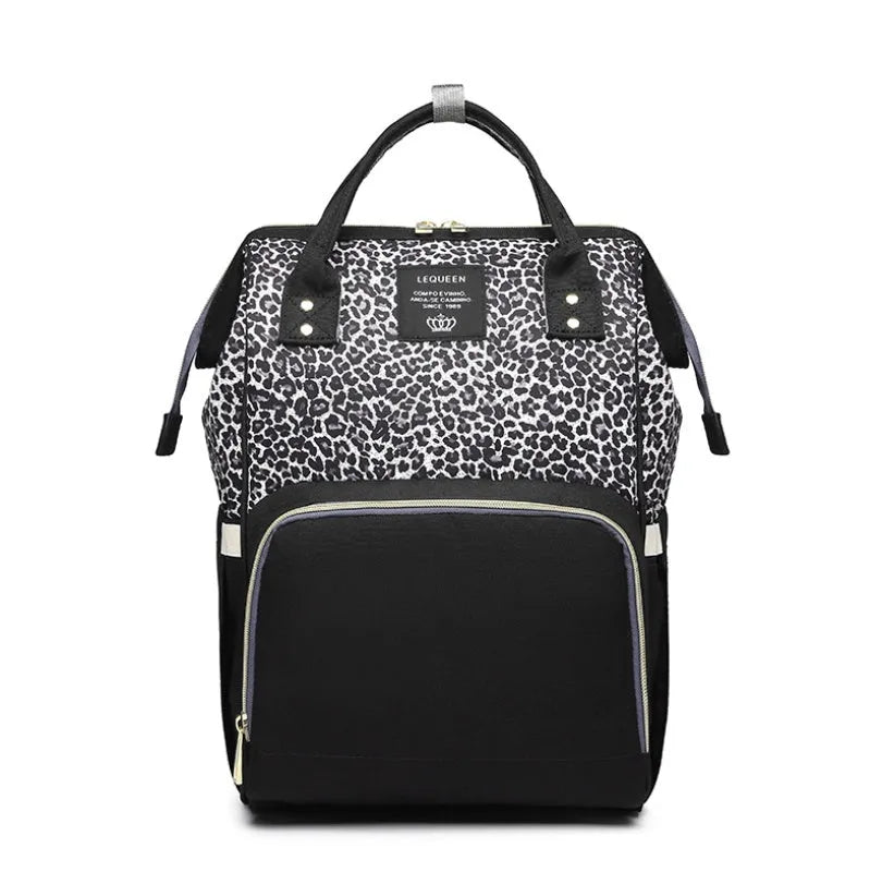 Oxford maternity nappy bag with 16-20L capacity, anti-theft design, bottle area, and multiple colour options