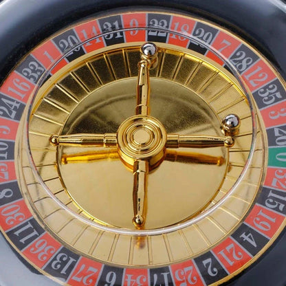 Electric casino-style roulette drinking game set with spinning wheel, shot glasses, and steel balls