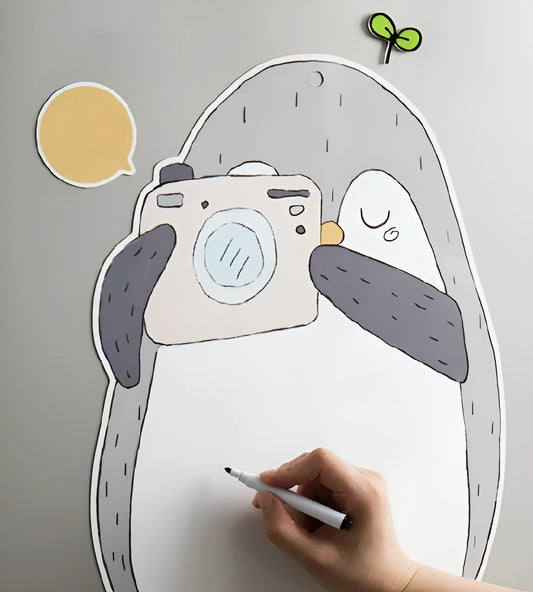 Penguin design Nordic style magnetic refrigerator message board measuring 45cm wide by 30cm tall