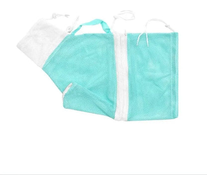 Upgraded fifth-generation cat grooming bag in pink and white colours on a table.