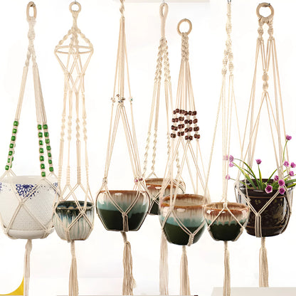 Woven wire lattice plant holder with natural cotton rope, shown in a rustic style supporting a green plant.