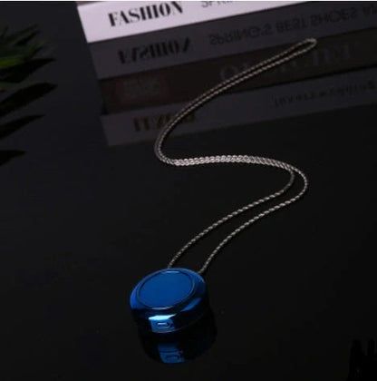 Portable negative ion air purifier necklace in blue, white, and silver