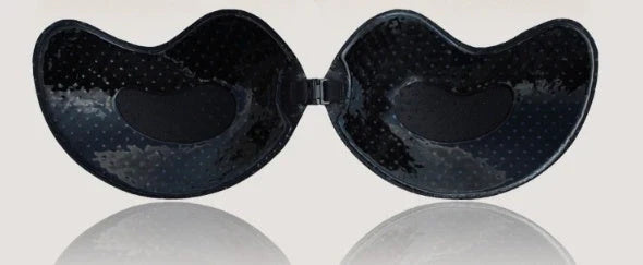 A discreet, backless and strapless silicone bra that provides a natural lift and invisible support under clothing.