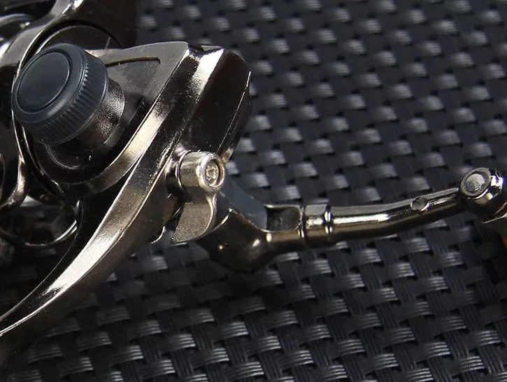 Mini 100 all metal fishing reel with high-strength folding rocker arm