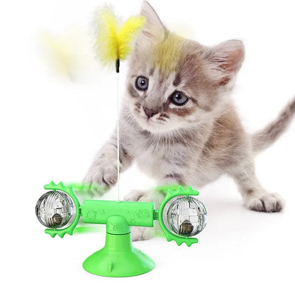 Cat rotating windmill toy with suction base, two transparent bins, blue and yellow-green TPR body.