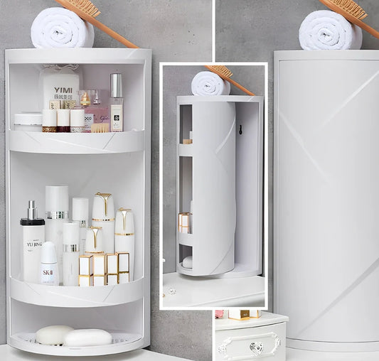 White triangle corner shelf with three tiers mounted in bathroom corner holding toiletries