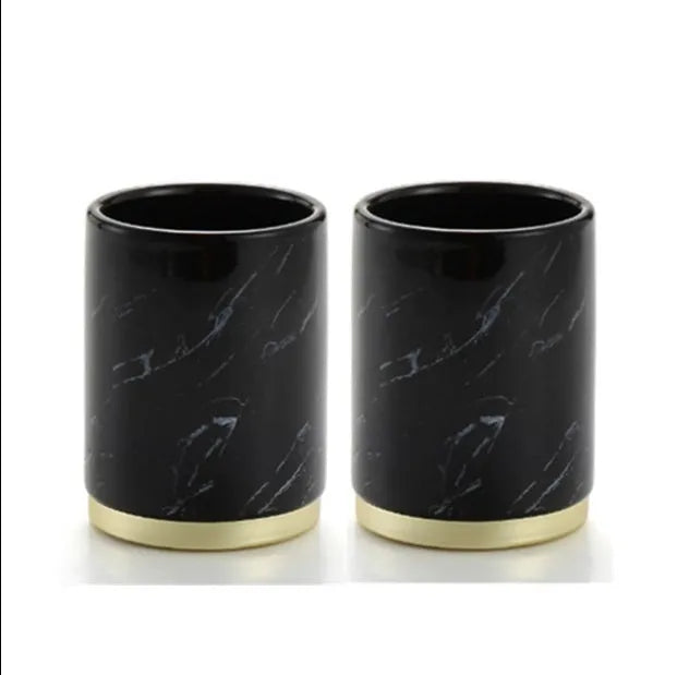 Ceramic bathroom set with bright glaze showing emulsion bottle, cup, toothbrush holder and soap dish
