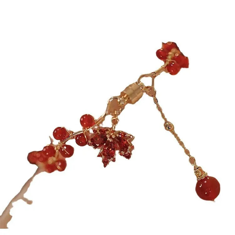 Red ginkgo leaf charm on an alloy magnetic bracelet with a natural Chinese style.
