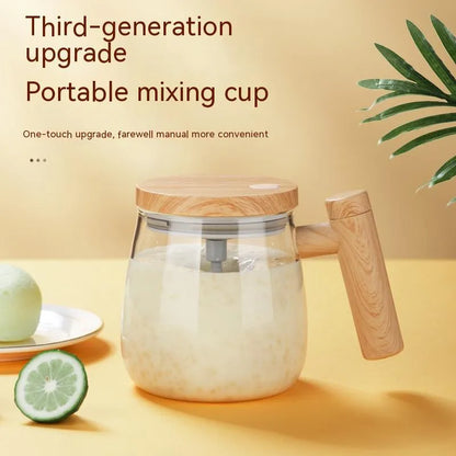 Clear borosilicate glass self-stirring coffee mug with 400ml capacity and electric mixing button