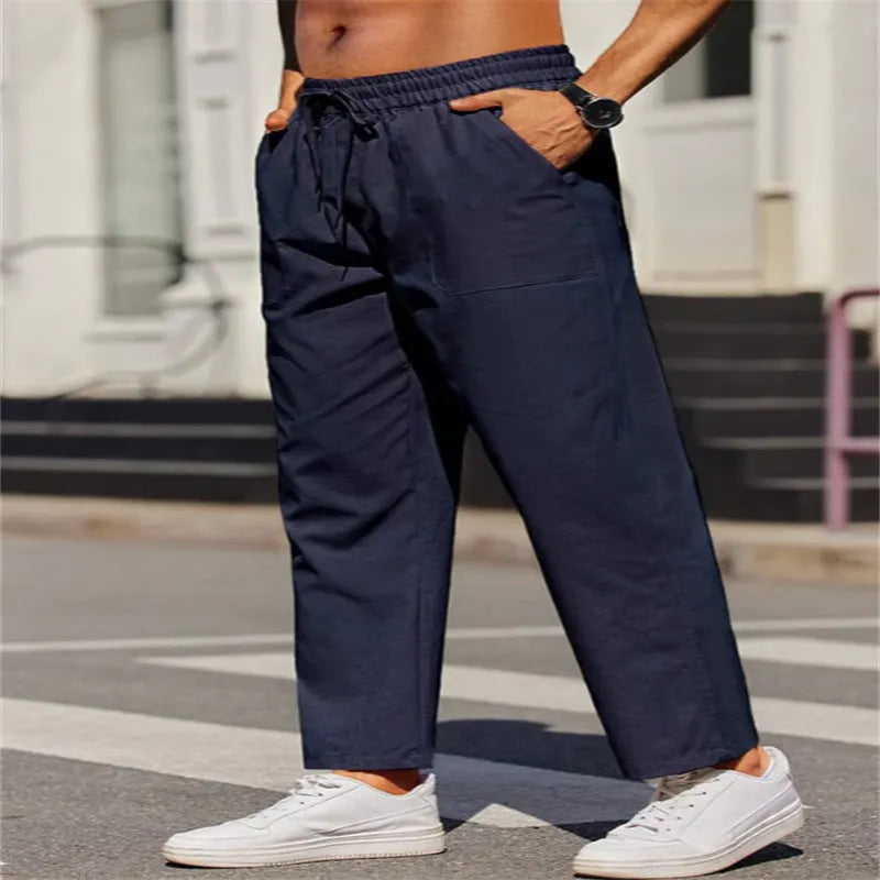 Men's straight-leg linen trousers in apricot colour with elastic waistband