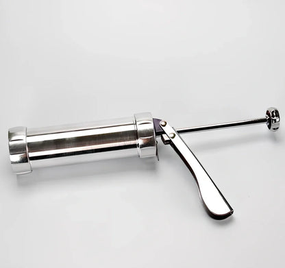 Stainless steel cookie press with 20 pattern discs for making uniform biscuits