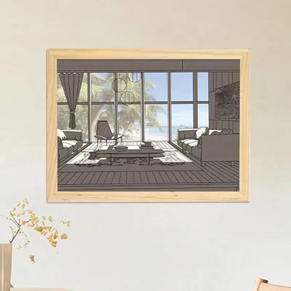 LED illuminated decorative picture light on a table showing a scenic landscape image glowing from within.