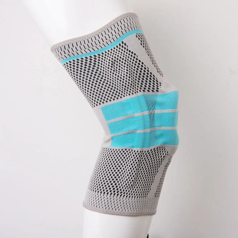 Sky blue silicone and elastic fibre basketball knee pads for running, shown in size L.