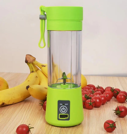 Pink portable USB electric fruit juicer blender cup with stainless steel blade and carry handle.