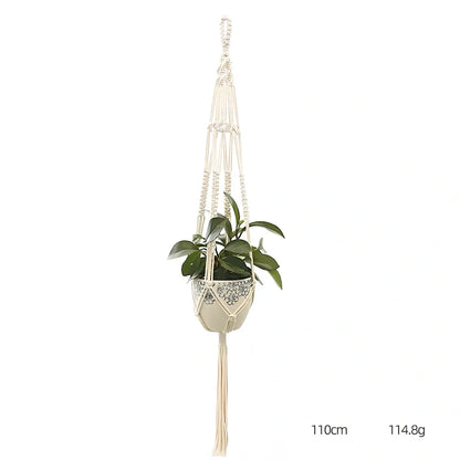 Hand-knitted cotton flowerpot net bag showing mesh pattern and hanging installation
