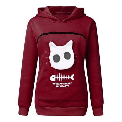 A cozy and stylish women's hooded sweatshirt with a unique cat-themed pocket design, available in a variety of vibrant colors.