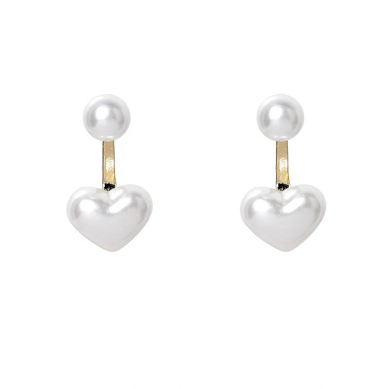 Elegant heart-shaped pearl stud earrings for women, perfect for gifts or personal style.