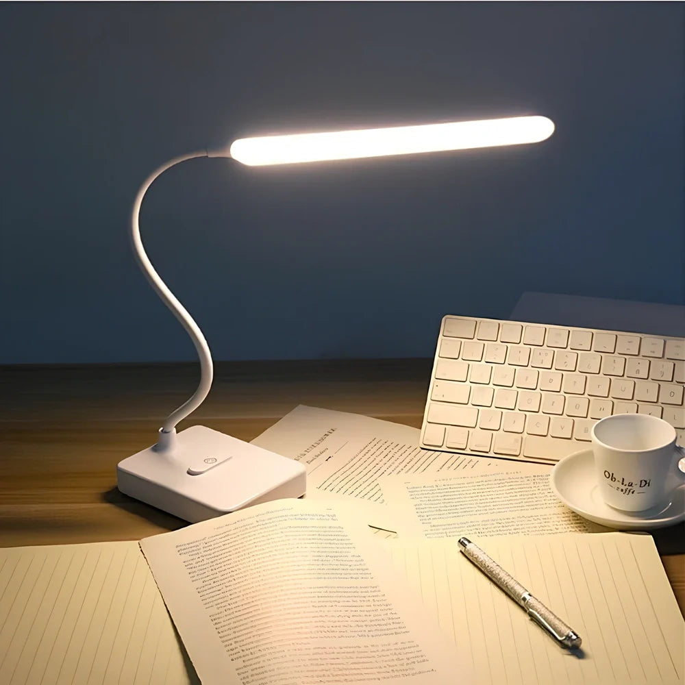 White LED desk lamp with adjustable arm and touch controls showing three colour temperature options