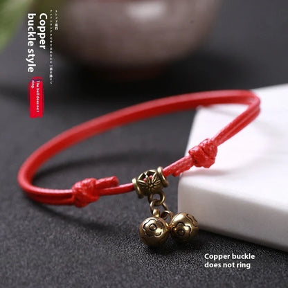 Adjustable nylon rope dog collar with brass bell in black, red, and coffee colour options