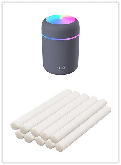 Car USB humidifier with 300ml water tank capacity and 25-35ml/h spray volume for continuous moisture without desktop wetting, featuring colourful atmosphere lights and low noise operation