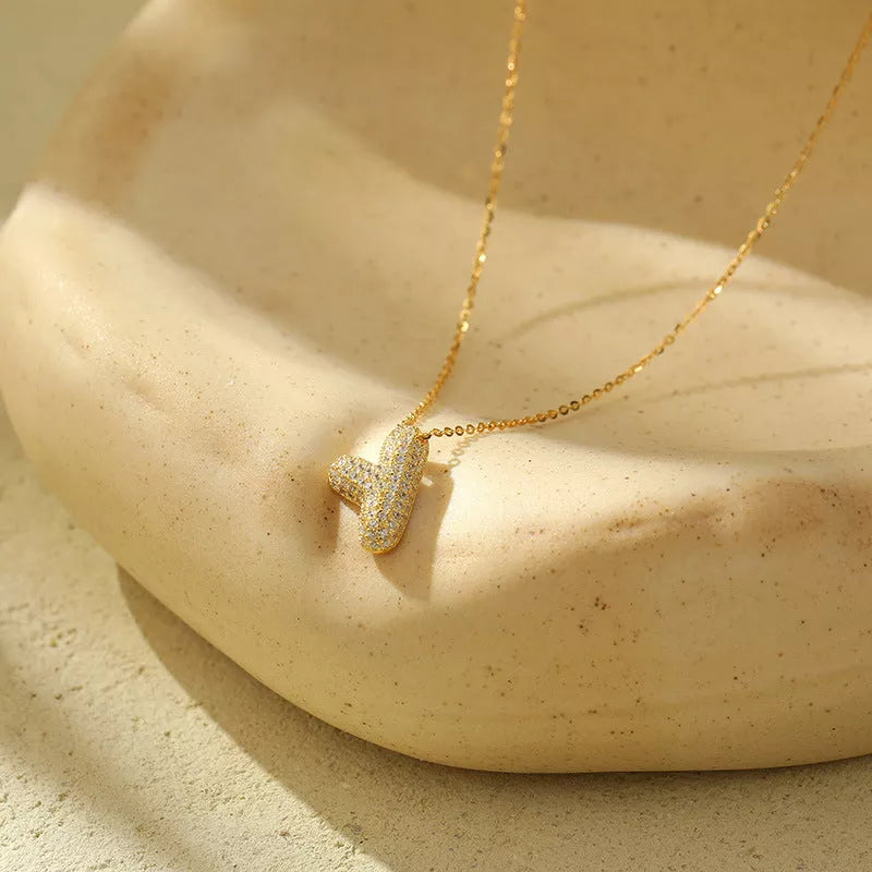 Stainless steel initial pendant necklace with zircon accents, personalized with your choice of letter.