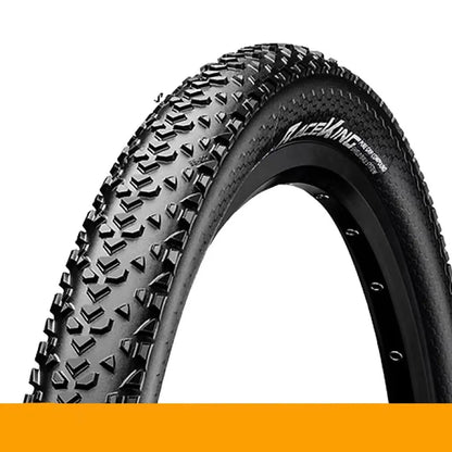 Mountain bike folding outer tyre with yellow sidewall, showing tread pattern and size label