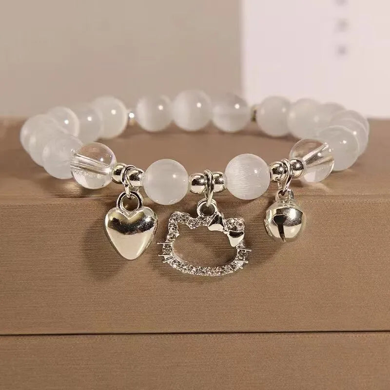 Chinese style glass bead bracelet with bamboo joint design on wrist.