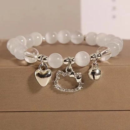 Chinese style glass bead bracelet with bamboo joint design on wrist.