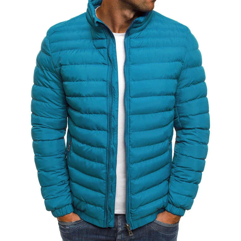Warm padded winter jacket for men in various solid colors, featuring zippered pockets and a loose, comfortable fit for easy layering.